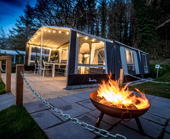 Luxury glamping tent with firepit